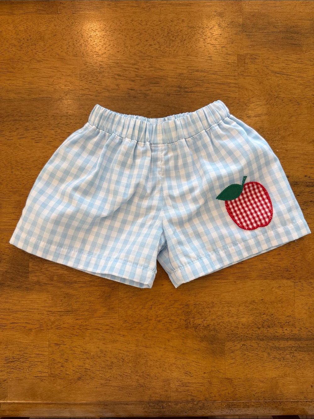 The Beaufort Bonnet Company Light Blue Gingham Shorts with Red Apple Patch